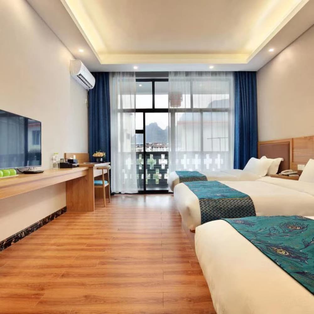 Фото Yangshuo Qingyunge Hotel