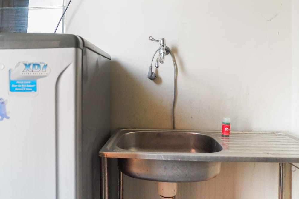 Фото Minimalist 2br at Dian Regency by Travelio