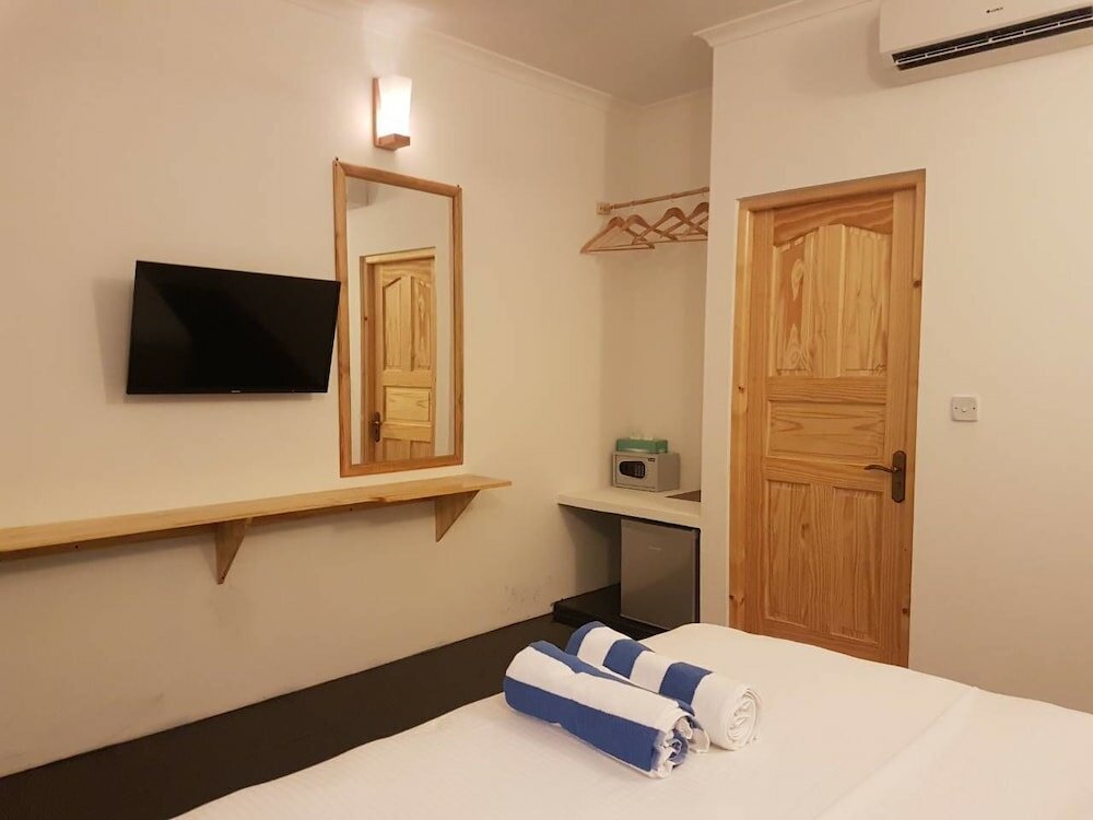 Фото Thoddoo Beach Holiday Inn