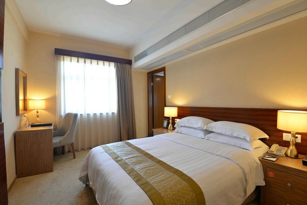 Фото Ming Wah Apartment Shenzhen