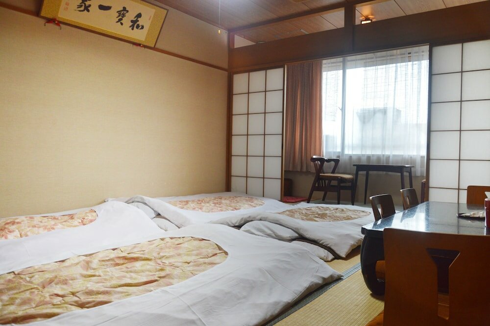Фото Masuya Ryokan