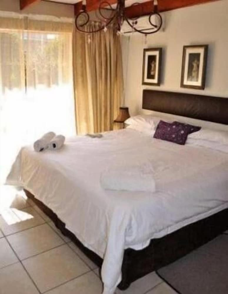 Фото Angels Haven Guesthouse