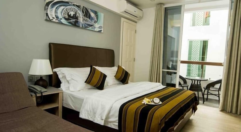 Фото Coconut Tree Hulhuvilla Beach