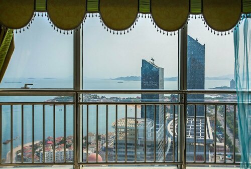 Гостиница Qingdao Jinshan We Holiday Apt Wusi в Циндао