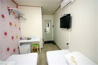 Фото Goodstay Tomo Residence