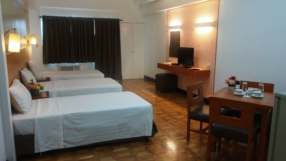 Фото Bsa Suites Makati