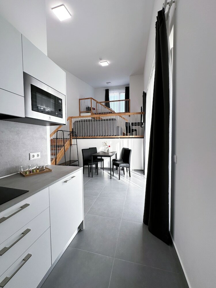 Фото Grazora Living Apartments