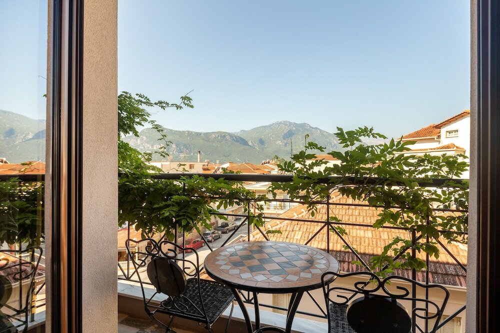 Фото Toti Boutique Rooms