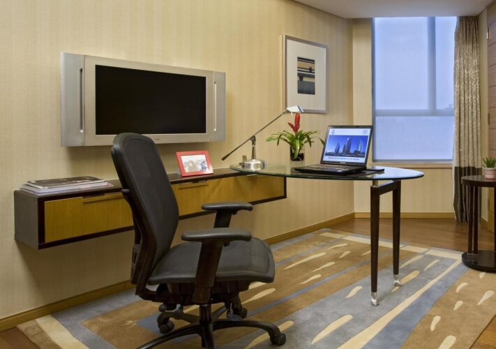 Фото Sheraton Grand Shanghai Pudong Hotel & Residences