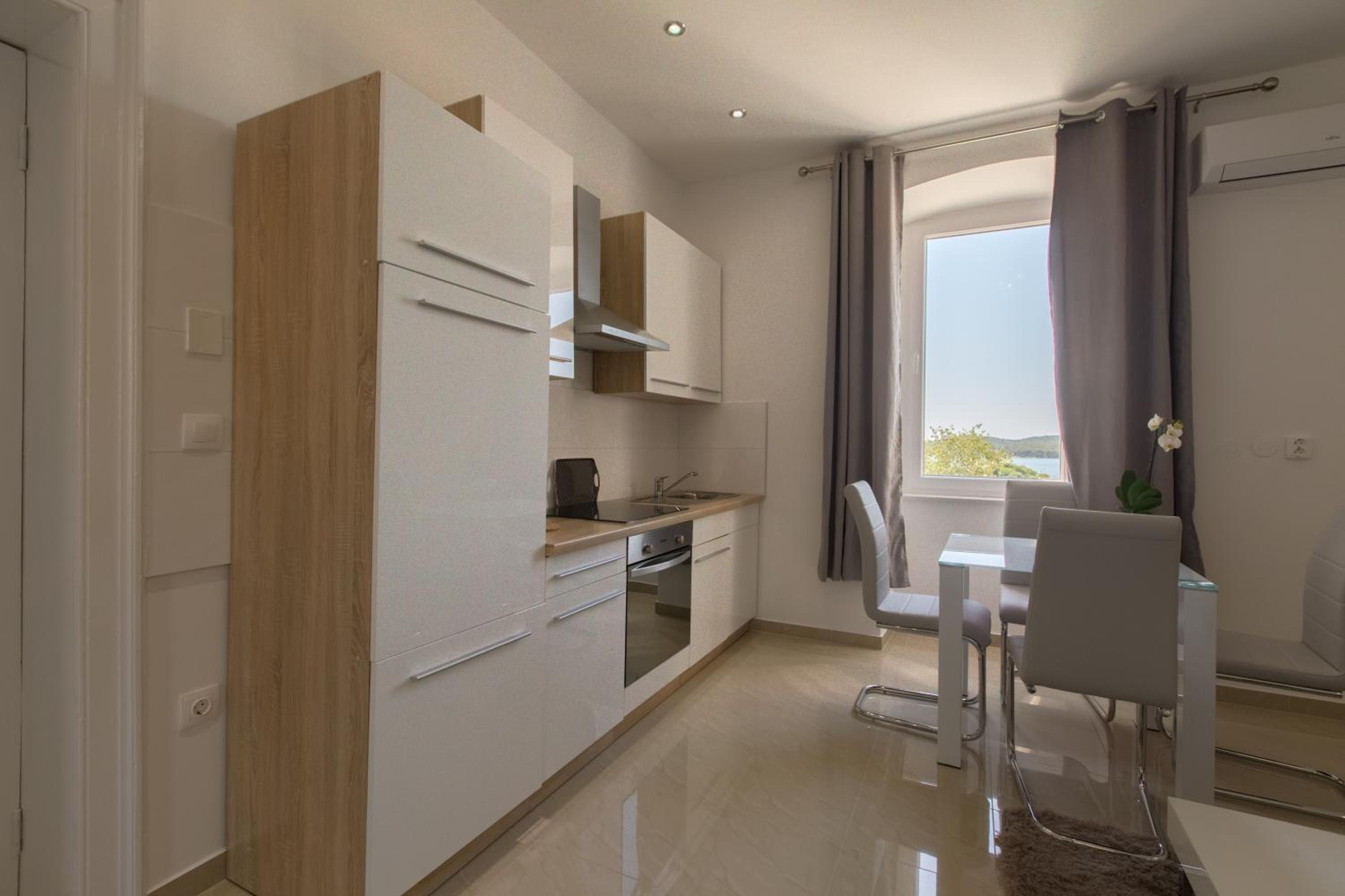 Фото Captain Emo City Apartments