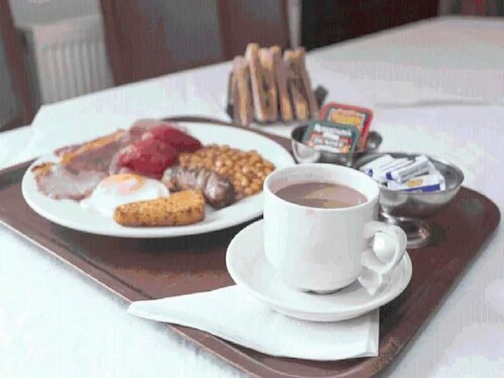 Фото Oyo Ridgeway Hotel