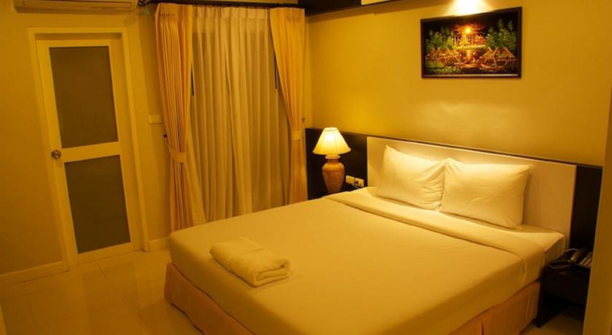 Фото Airport Mansion Phuket