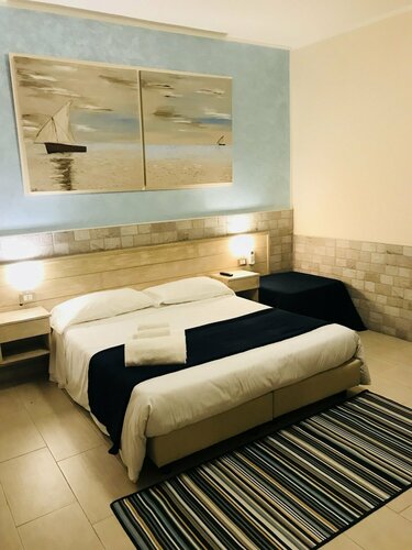 Гостиница Fiumicino Airport B&b Deluxe в Фьюмичино