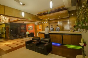 Апартаменты Rafflesia Serviced Apartments