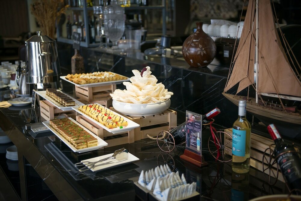 Фото Paradise Suites Hotel