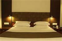 Фото Amantra Comfort Hotel