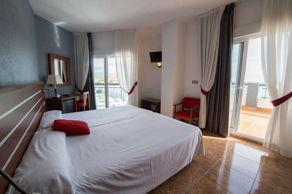 Фото Hotel La Familia Gallo Rojo