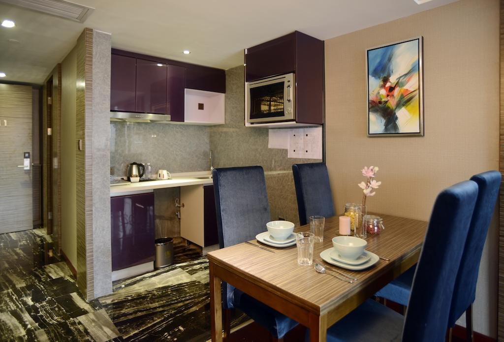 Фото La Perle International Hotel