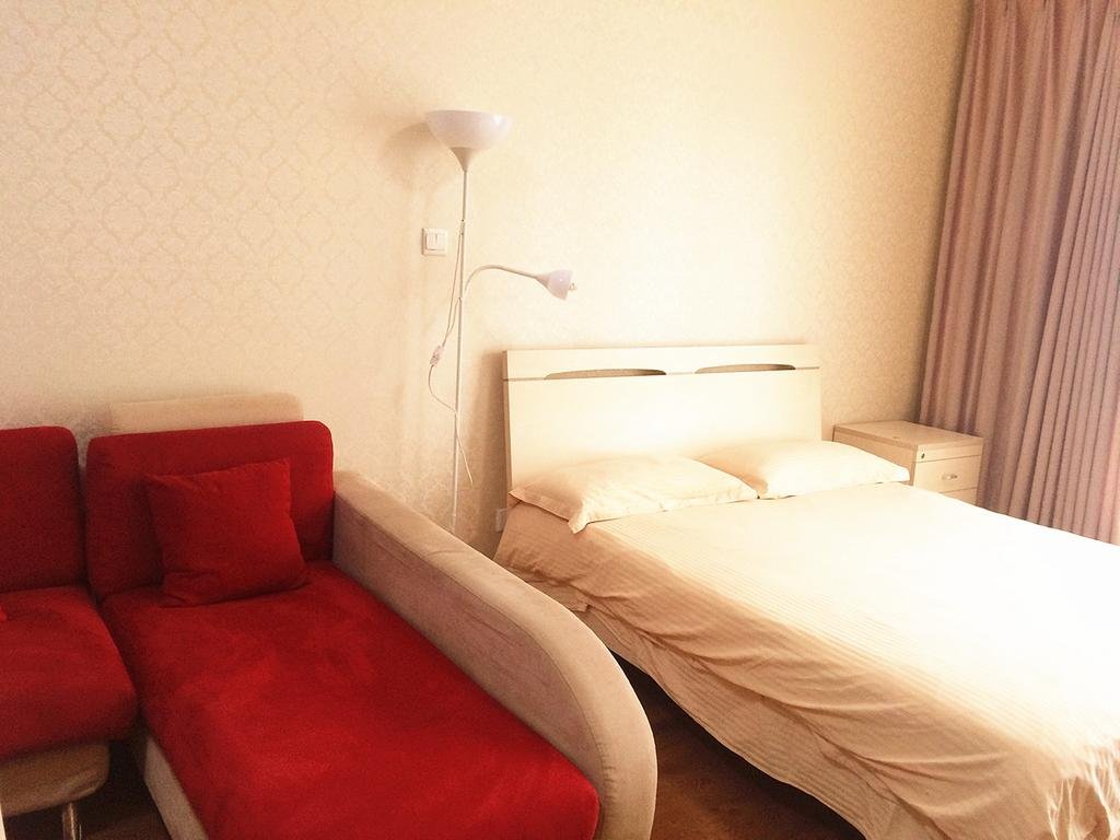 Фото China Sunshine Apartment Dacheng International