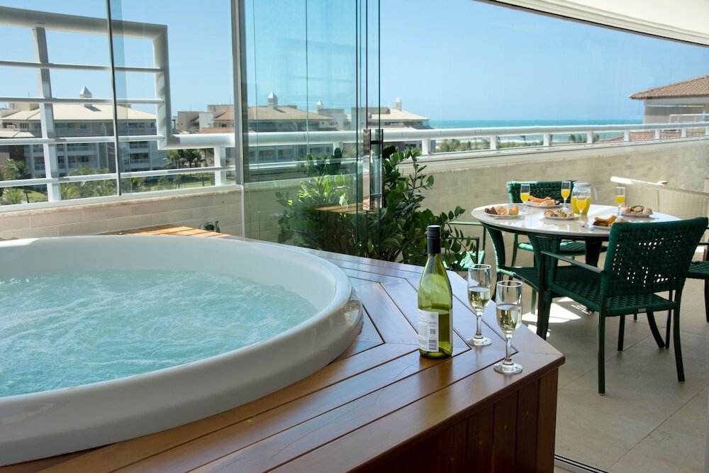 Фото Penthouse Apartment with Hot Tub near Beach