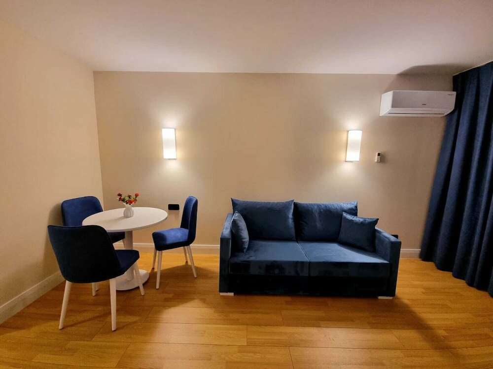 Фото Orbi Hotel Apartments