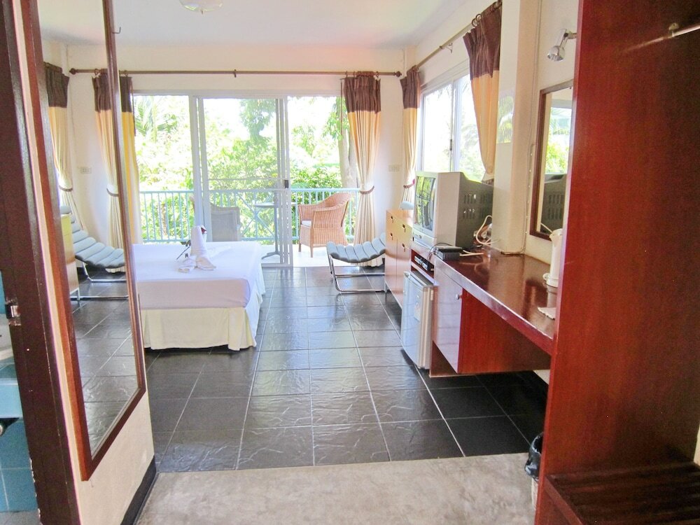 Фото Thaniza Beachfront Resort