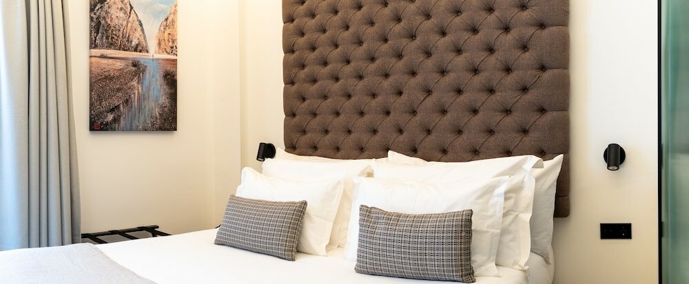 Фото Boutique Hotel Petit Montisión