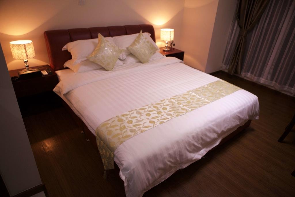 Фото Guangzhou Yi Long International Apartment