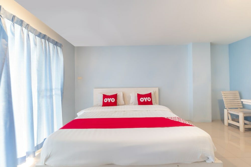 Фото Oyo 75363 V Place Apartment