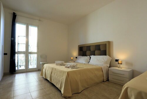 Гостиница Bed and Parking Cecina Rooms в Чечине