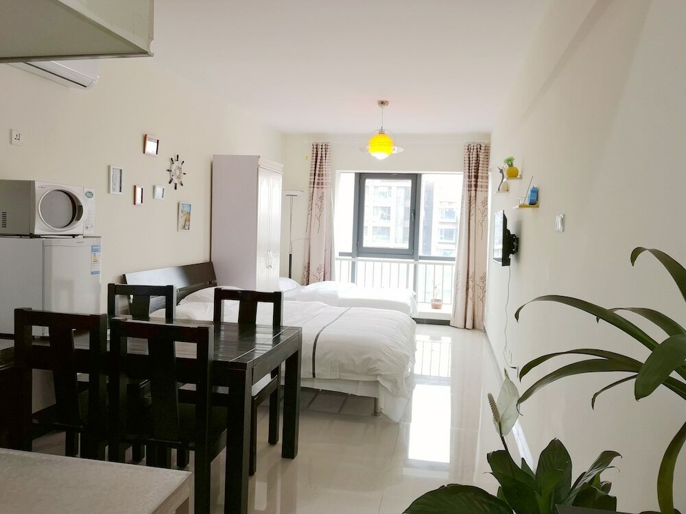 Фото Xiwangju Apart-hotel