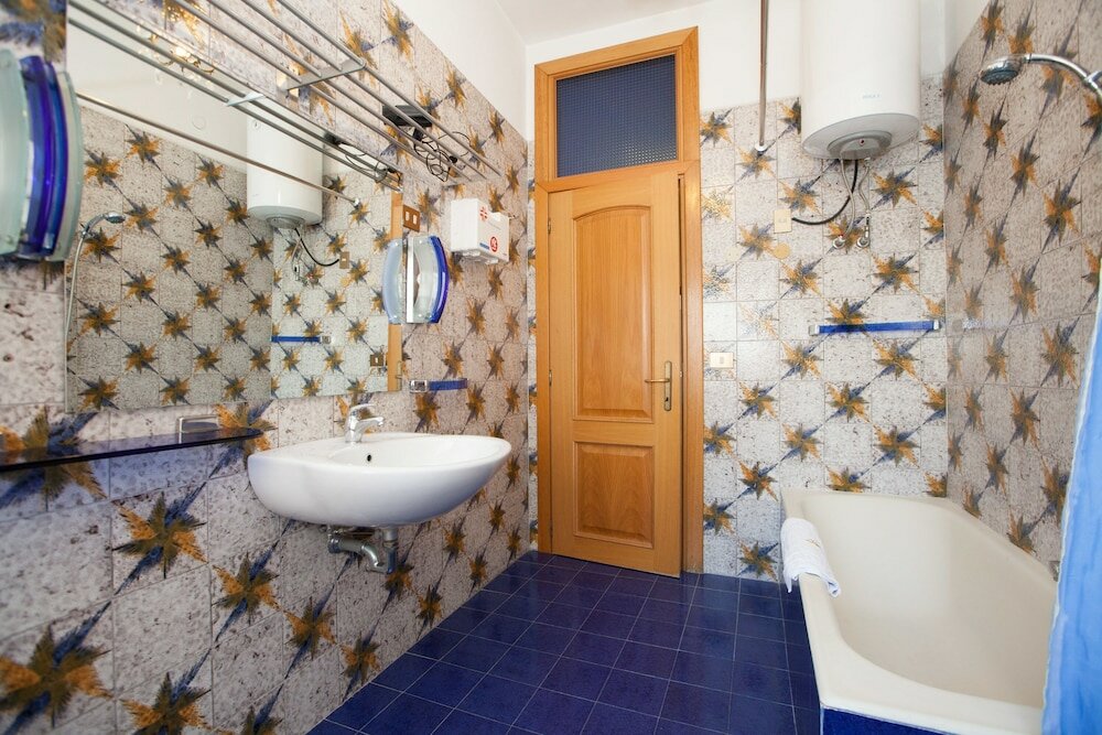 Фото Rental In Rome Devoti Apartment