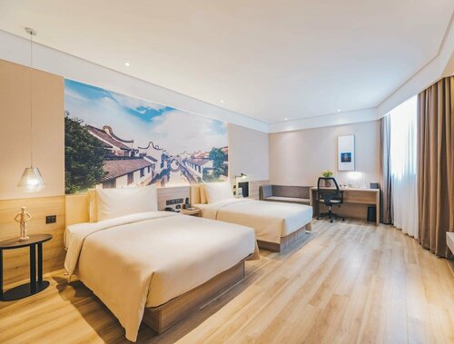Гостиница Atour Hotel Railway Station Dalian в Даляне