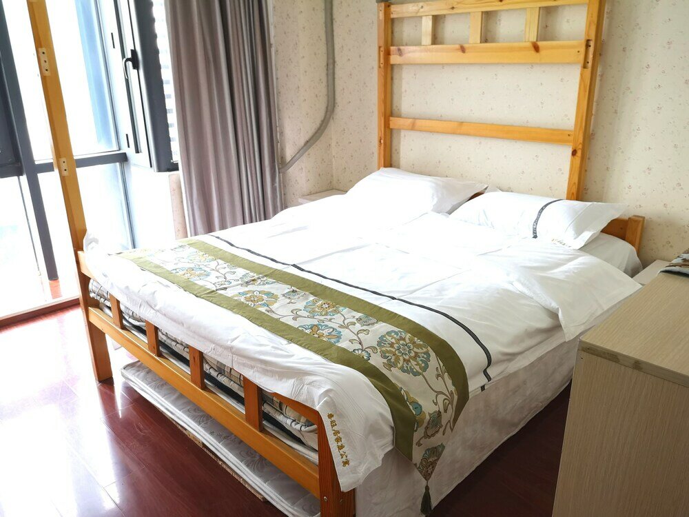 Фото Xiwangju Apart-hotel