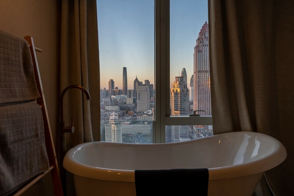 Фото Tianjin G'apartment