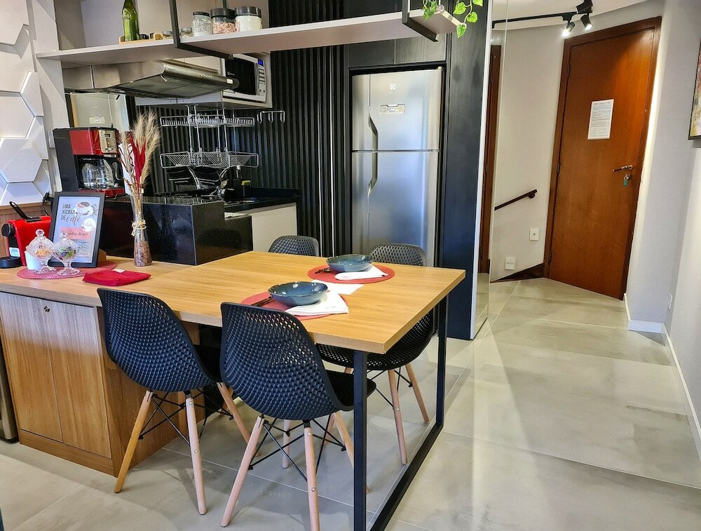 Фото Dúplex Luxo com Piscina Aquecida, Lareira e Wifi