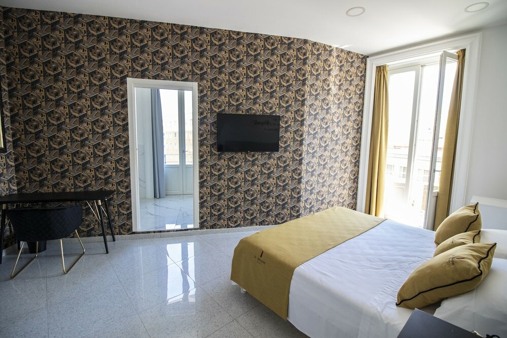 Фото Le Angioine Rooms