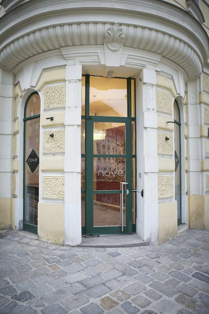 Фото Nove Boutique Apartments