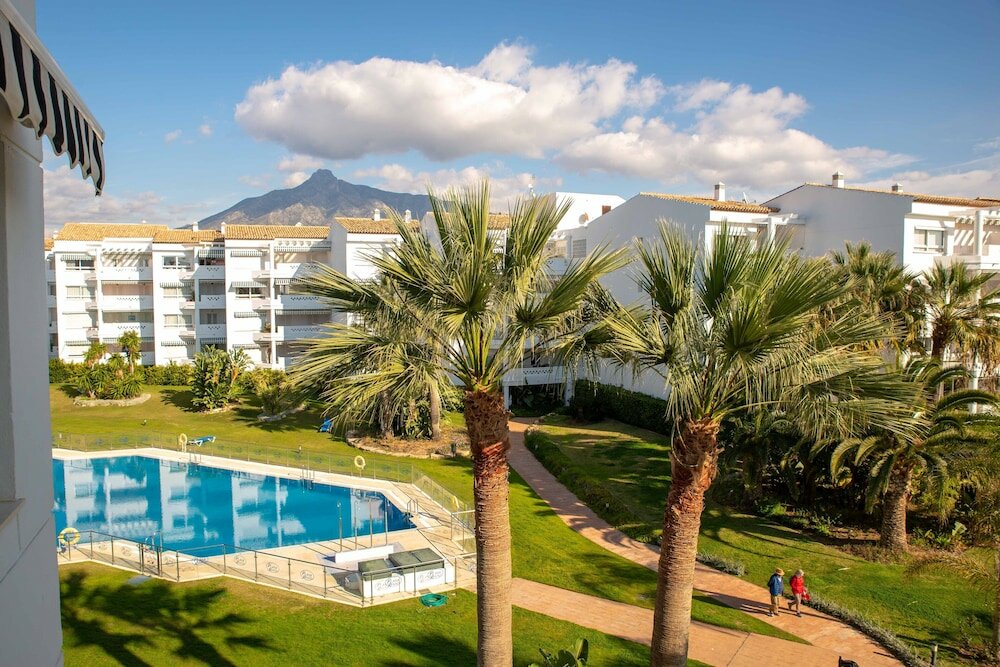 Фото Whispering Palms Apartment