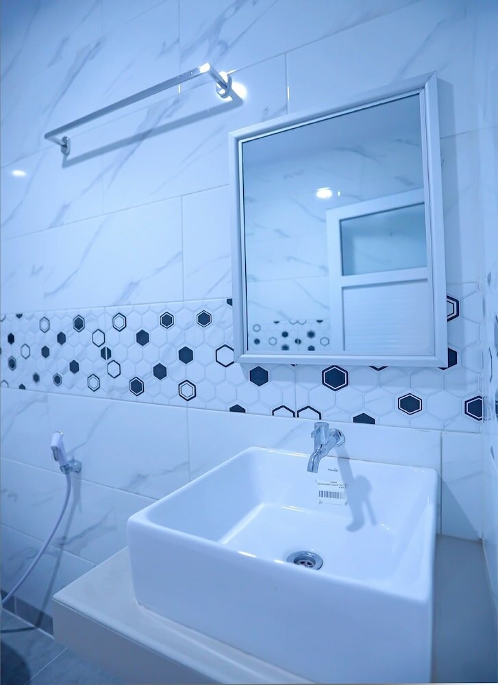 Фото Super Oyo Capital O 92096 Kuala Ulee Lheue Residence Syariah