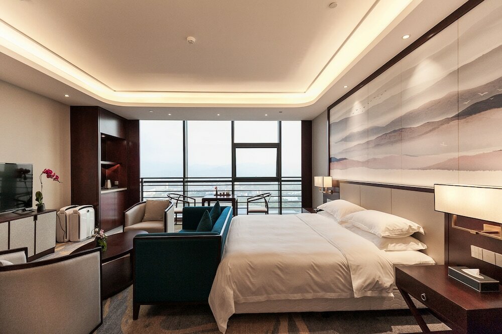 Фото Jinyi Jinglan Hotel