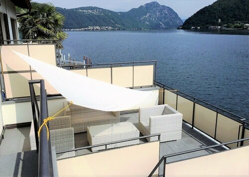 Гостиница Direct on Lugano Lake: Take a Swim From Your Villa