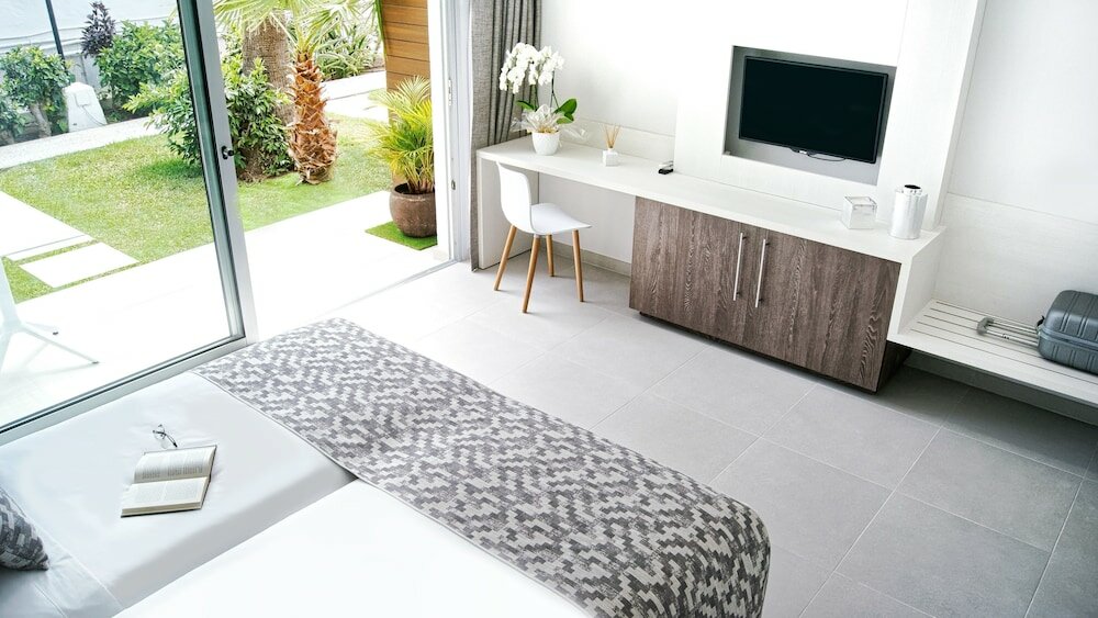 Фото Sanom Beach Resort - Adults Only 