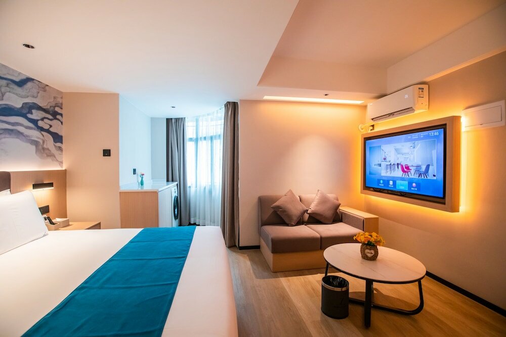 Фото Naive L Executive Apartments Coast City