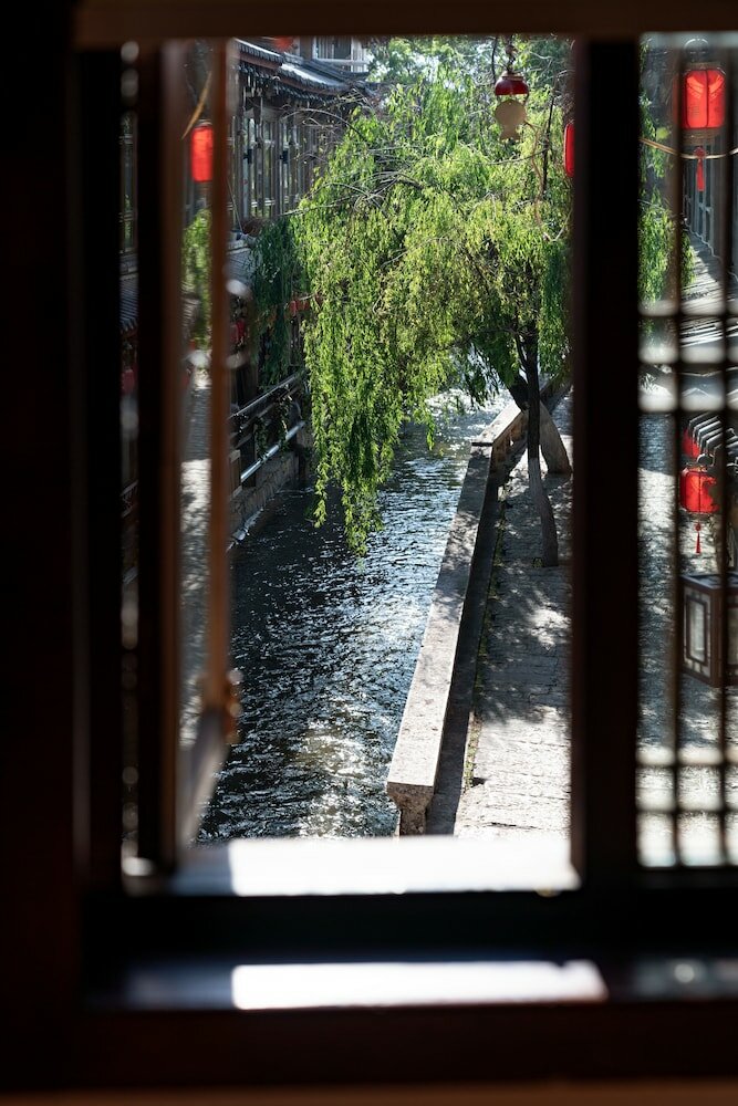 Фото Lijiang Xueshanyu Inn