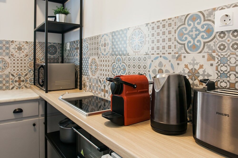 Фото Rastoni Athens Suites nearAcropolis at Tsatsou Street