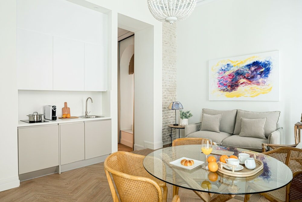 Фото Mylu Suites by Puerta Catedral