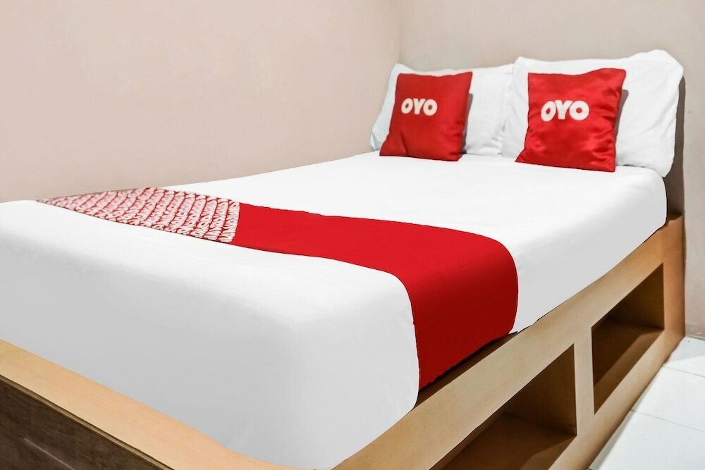 Фото Spot On 91336 Guesthouse Tarumanegara