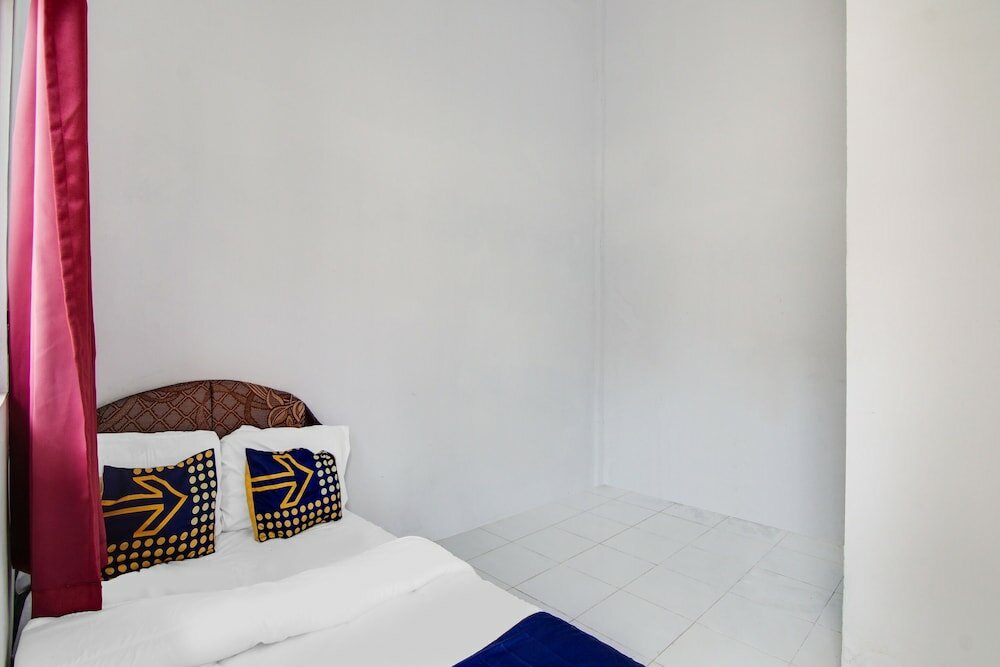 Фото Spot On 91858 Raja Homestay Syariah