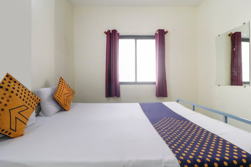 Фото Spot On 37095 Sai Sidhi Lodge